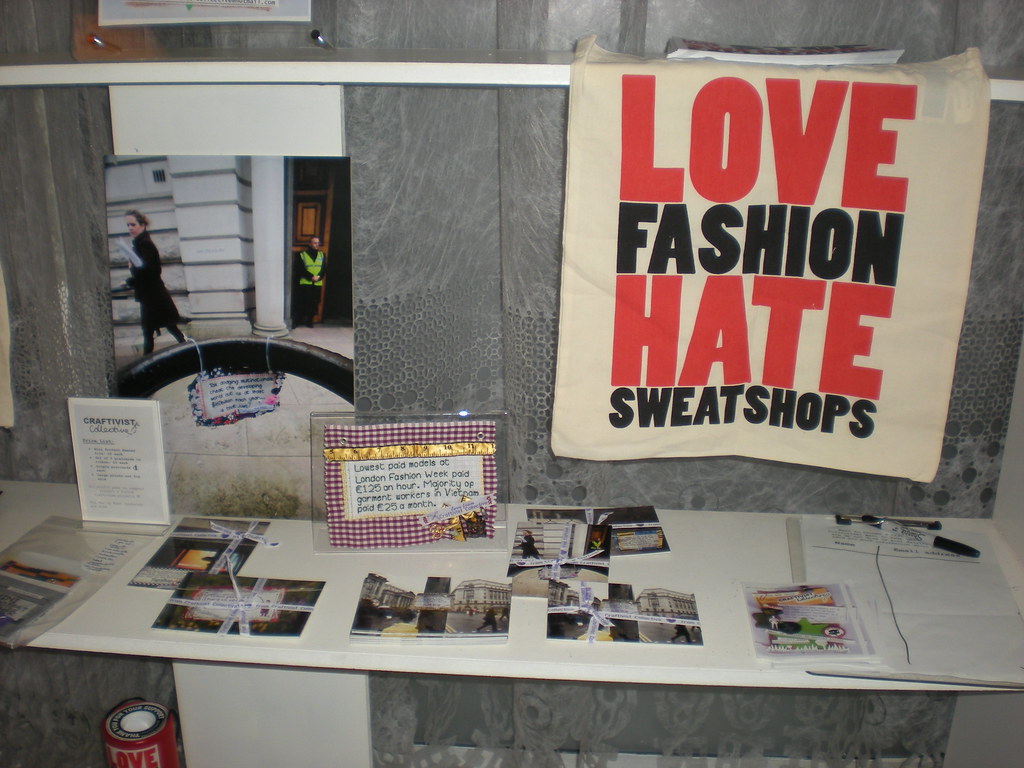 realistic vintage fashion boutique with delicate garments on racks detail